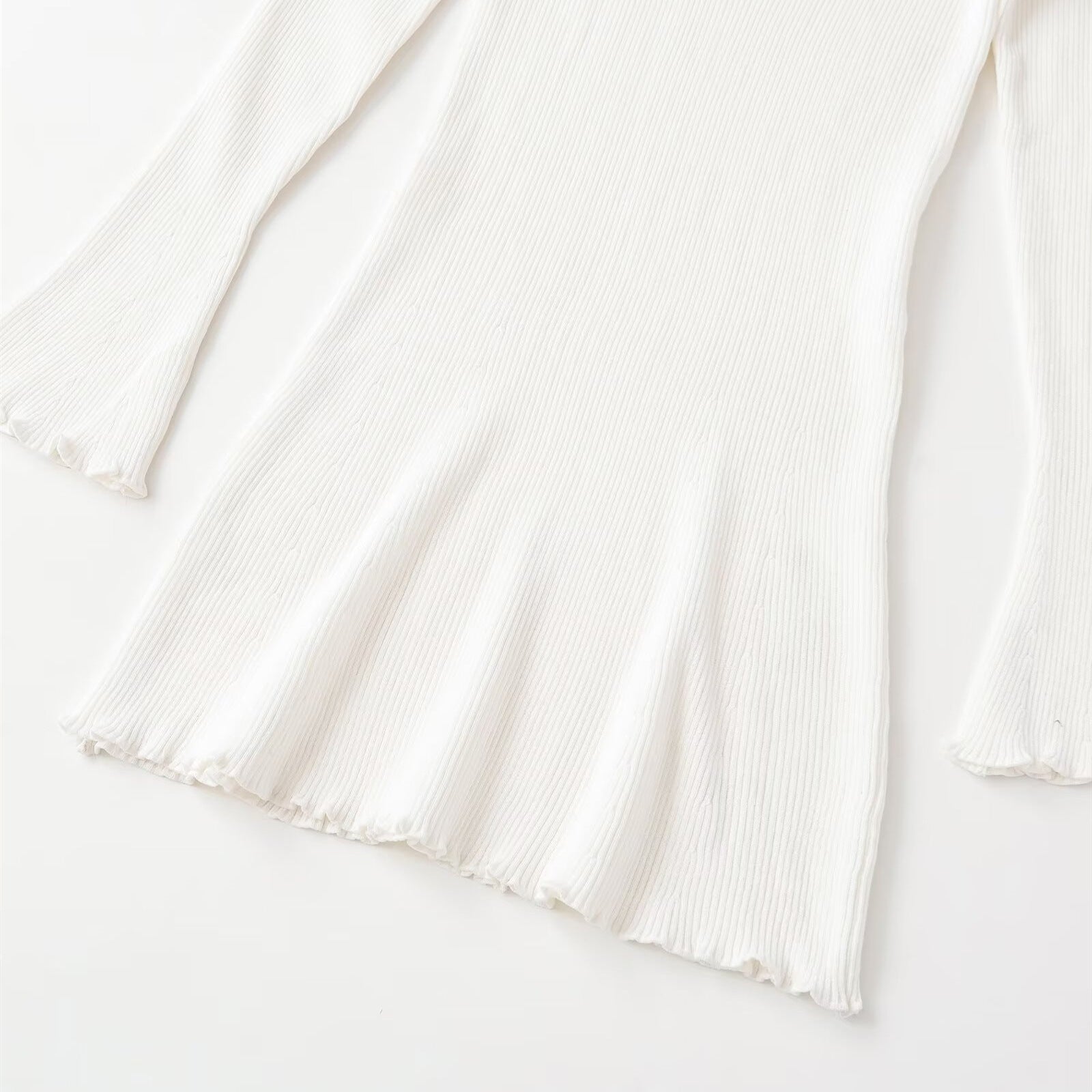 Long sleeved high neck wavy ribbed knitted dress