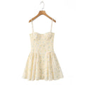 Holiday style floral waist cinching camisole dress